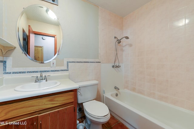 20 Yorkshire Pkwy, Gulfport, MS 39503 - bathroom featuring vanity, toilet, shower / washtub combination, tile walls, and wainscoting