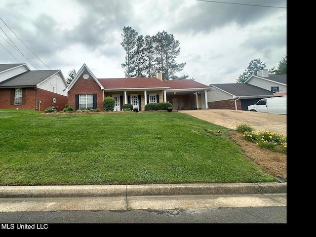 713 Hawthorn Green Dr, Ridgeland, MS 39157 - ranch-style house with concrete driveway, a carport, brick siding, a front lawn, and a chimney
