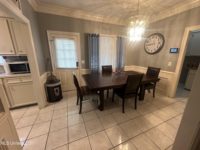 713 Hawthorn Green Dr, Ridgeland, MS 39157 - dining room with a chandelier, light tile patterned flooring, and ornamental molding