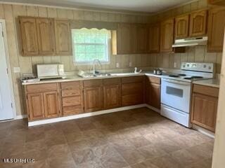 kitchen with light countertops, under cabinet range hood, a sink, white electric range, and brown cabinetry