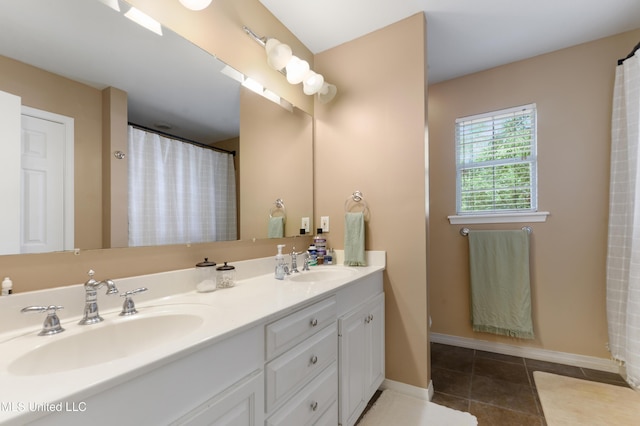 681 Beaver Dam Rd, Perkinston, MS 39573 - bathroom with double vanity, tile patterned flooring, and curtained shower