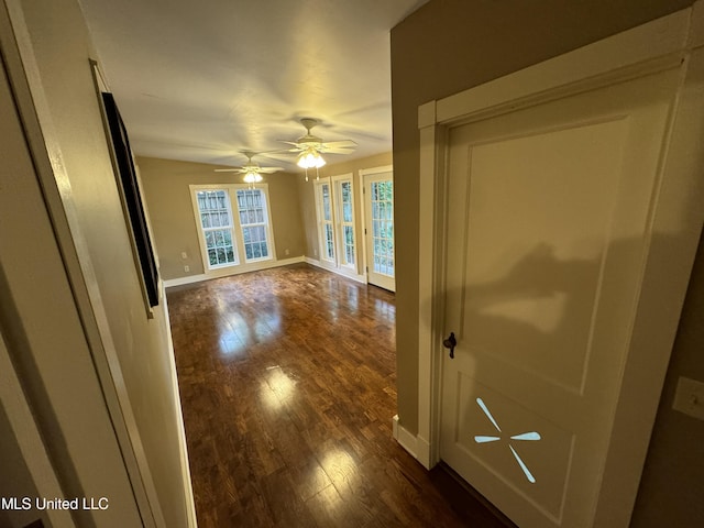 spare room featuring dark hardwood / wood-style floors and ceiling fan