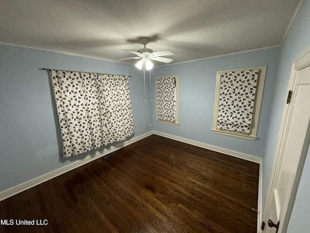 unfurnished room featuring crown molding, a textured ceiling, wood-type flooring, and ceiling fan