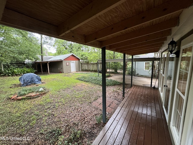 view of yard featuring a shed and a patio