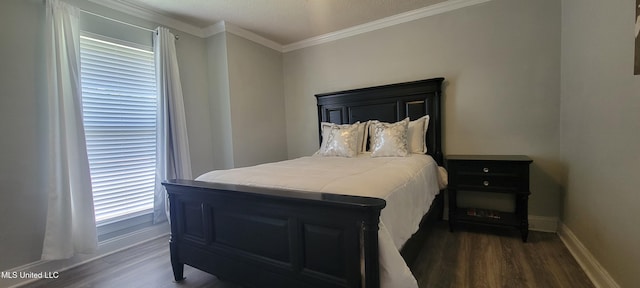 8422 Kaleki Way, Diamondhead, MS 39525 - bedroom featuring dark wood finished floors, baseboards, and ornamental molding