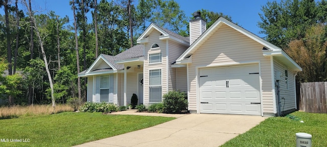 8422 Kaleki Way, Diamondhead, MS 39525 - view of front of house featuring concrete driveway, a garage, and a chimney