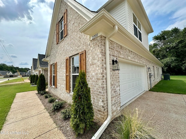 view of property exterior with a yard and a garage