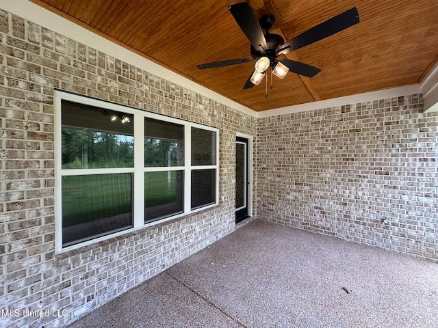 view of patio featuring ceiling fan