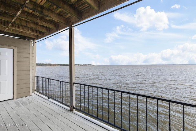 deck featuring a water view