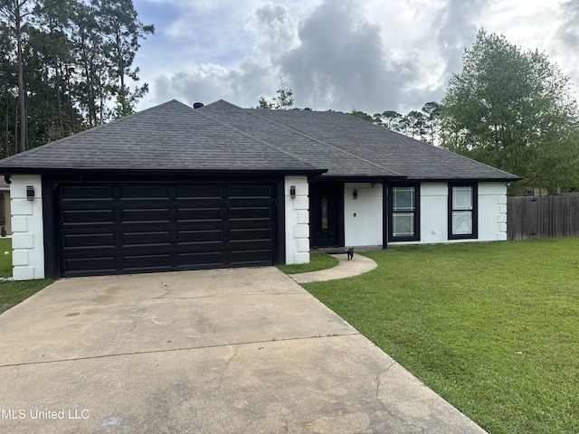 single story home featuring driveway, a shingled roof, and a front lawn