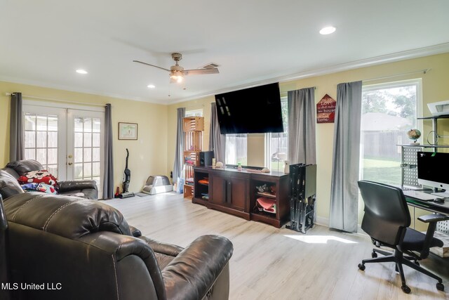 8412 Kaleki Pl, Diamondhead, MS 39525 - living area with french doors, wood finished floors, a desk, a ceiling fan, and crown molding