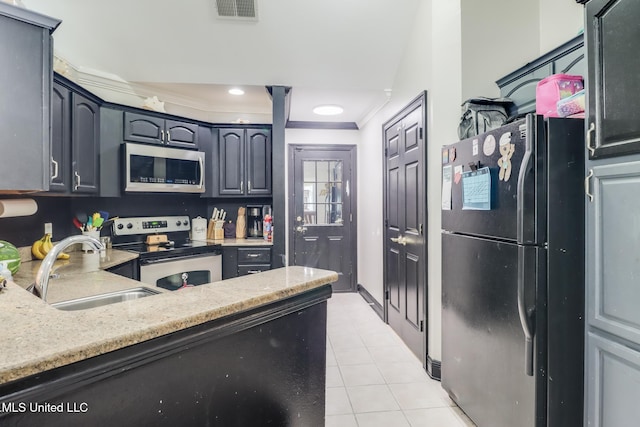 8412 Kaleki Pl, Diamondhead, MS 39525 - kitchen with appliances with stainless steel finishes, a sink, ornamental molding, light tile patterned flooring, and light stone counters