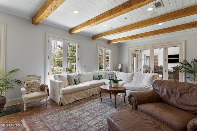 living room featuring french doors, dark parquet floors, and beamed ceiling