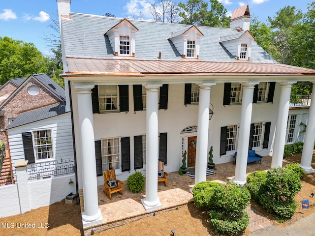 view of front of house with a patio