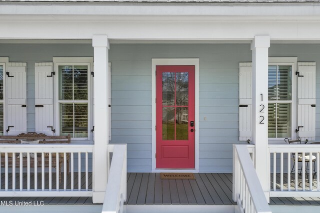 122 Aiken Rd, Waveland, MS 39576 - property entrance featuring covered porch