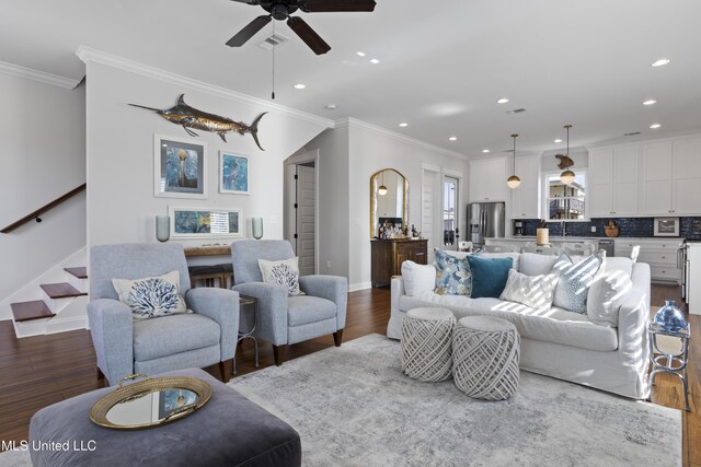 122 Aiken Rd, Waveland, MS 39576 - living room featuring visible vents, crown molding, baseboards, stairway, and dark wood-style floors