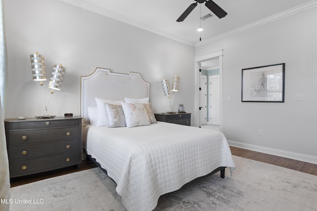 122 Aiken Rd, Waveland, MS 39576 - bedroom with visible vents, wood finished floors, crown molding, baseboards, and ceiling fan