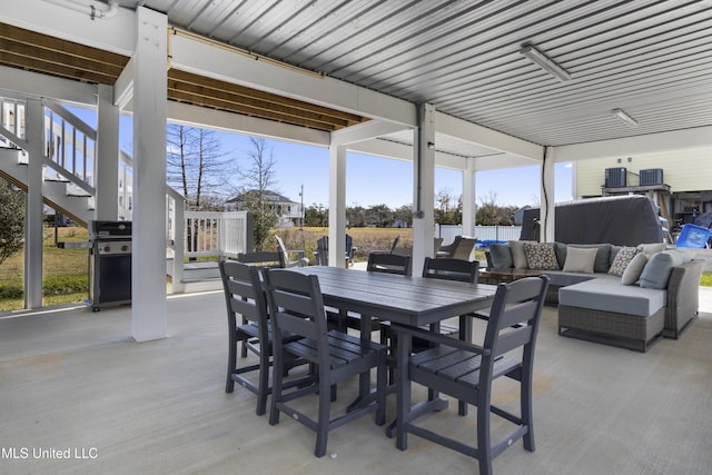 122 Aiken Rd, Waveland, MS 39576 - view of patio with stairway, outdoor lounge area, outdoor dining area, and grilling area