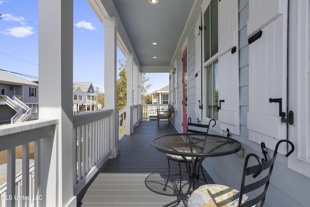 122 Aiken Rd, Waveland, MS 39576 - wooden deck with a residential view and a porch