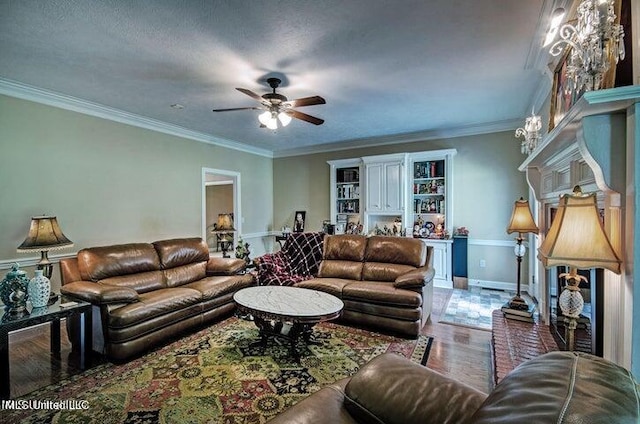 living room featuring ornamental molding, a textured ceiling, hardwood / wood-style floors, and ceiling fan