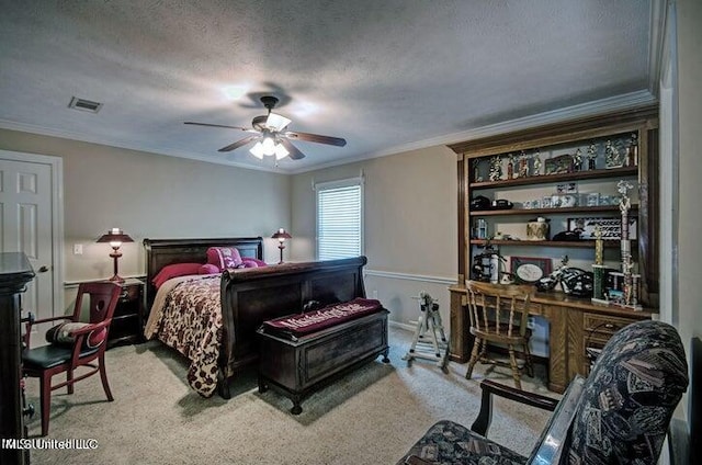 bedroom with a textured ceiling, visible vents, crown molding, and light carpet