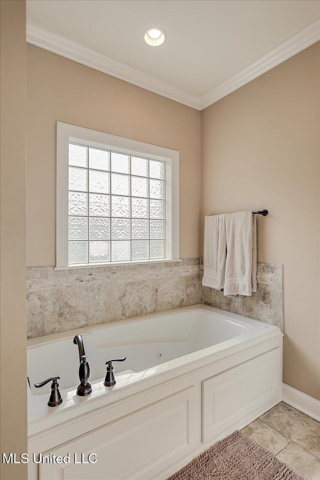 full bath with recessed lighting, a garden tub, crown molding, and baseboards