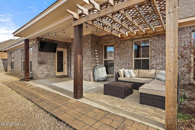 view of patio with outdoor lounge area and a pergola