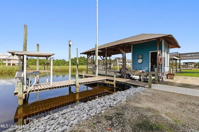 view of dock with a water view