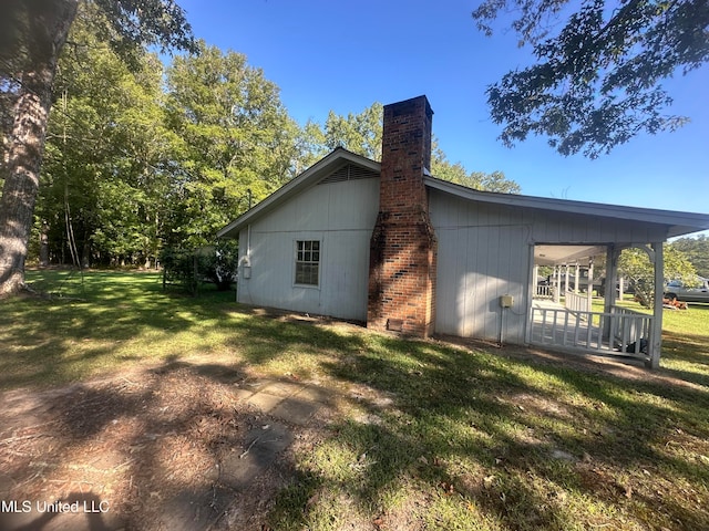 view of property exterior featuring a yard