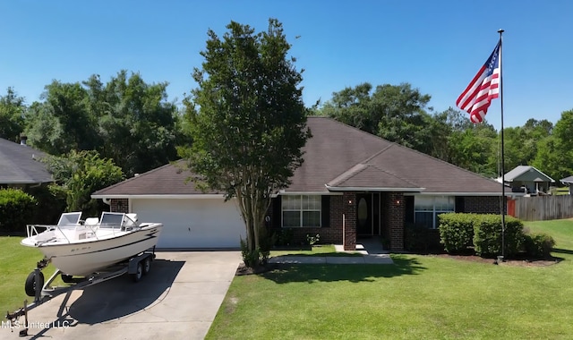 11295 Peyton Dr, Gulfport, MS 39503 - view of front of house with an attached garage, concrete driveway, and brick siding