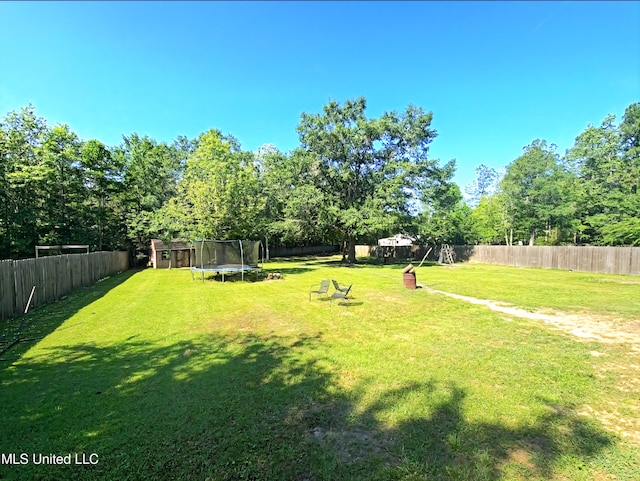 11295 Peyton Dr, Gulfport, MS 39503 - view of yard with a trampoline