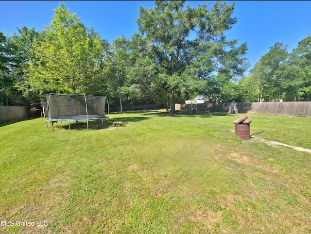 11295 Peyton Dr, Gulfport, MS 39503 - view of yard with a trampoline