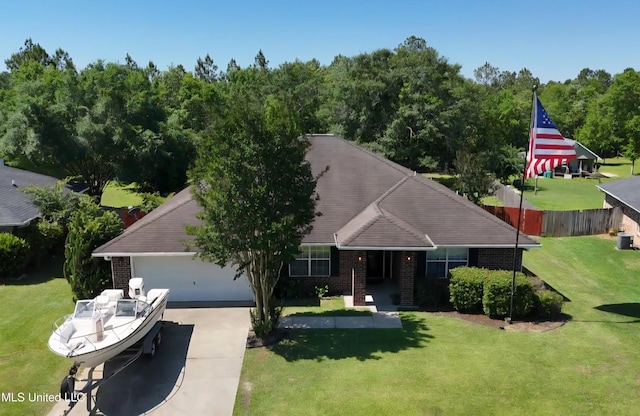 11295 Peyton Dr, Gulfport, MS 39503 - view of front facade with concrete driveway, brick siding, and a garage