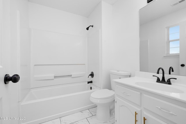 full bathroom featuring toilet, marble finish floor, vanity, visible vents, and bathing tub / shower combination