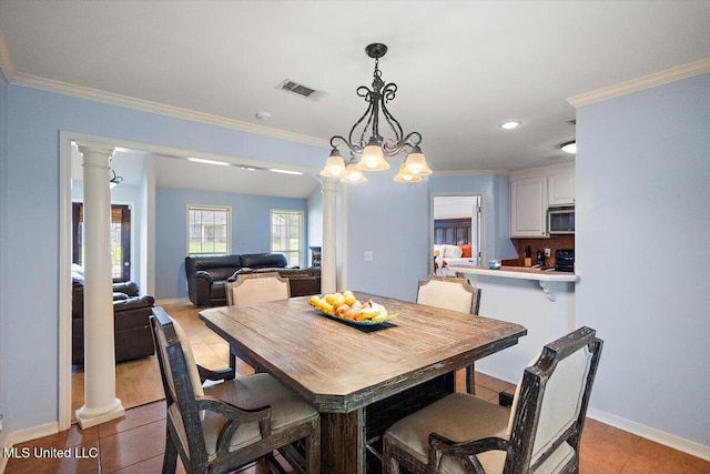 900 Redwood Cv, Byram, MS 39272 - dining space featuring decorative columns, ornamental molding, light tile patterned flooring, and recessed lighting