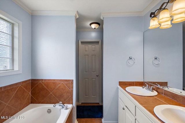 900 Redwood Cv, Byram, MS 39272 - bathroom featuring double vanity, a garden tub, and crown molding