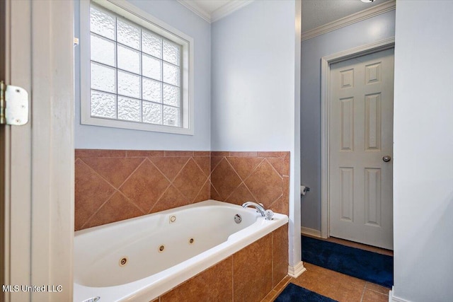 900 Redwood Cv, Byram, MS 39272 - bathroom with a tub with jets, tile patterned flooring, and crown molding