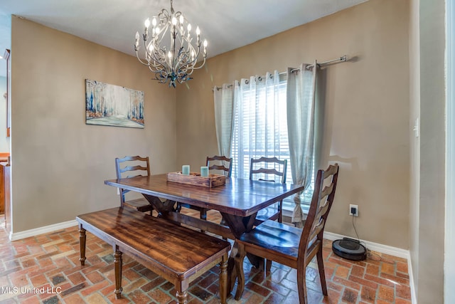 dining area with a chandelier