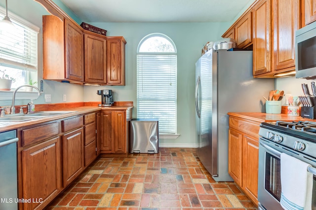 kitchen with sink and stainless steel appliances