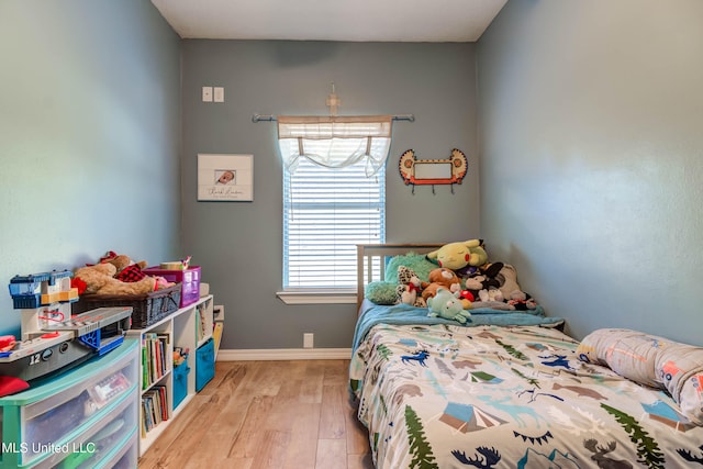 bedroom featuring light hardwood / wood-style flooring