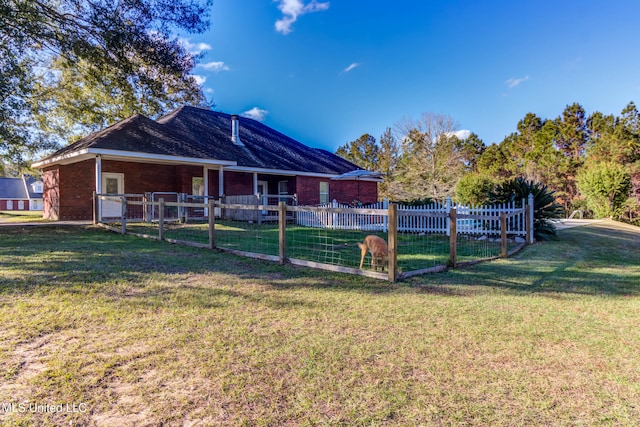 exterior space with a front yard