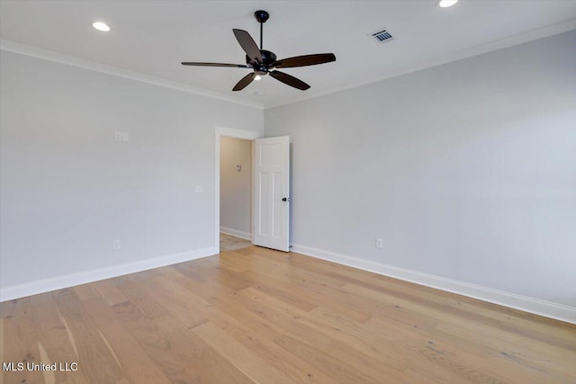 unfurnished room with light wood-style flooring, recessed lighting, visible vents, baseboards, and crown molding