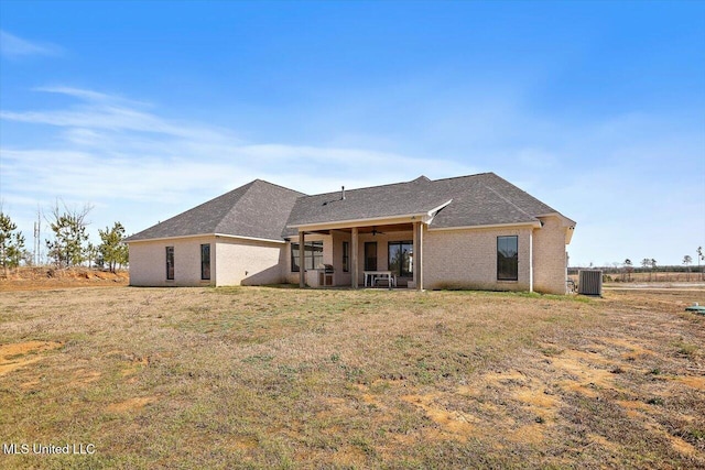 back of property with a yard, a patio area, central AC, and ceiling fan