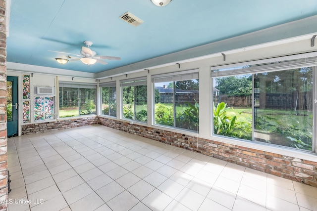 4 Briarwood Cir, Long Beach, MS 39560 - unfurnished sunroom featuring brick wall and tile patterned flooring