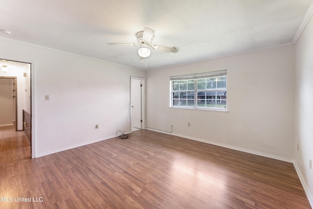 4 Briarwood Cir, Long Beach, MS 39560 - empty room with wood finished floors, a ceiling fan, and ornamental molding