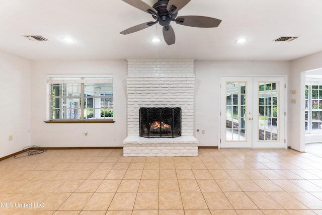 4 Briarwood Cir, Long Beach, MS 39560 - unfurnished living room with a ceiling fan, recessed lighting, a brick fireplace, french doors, and light tile patterned floors