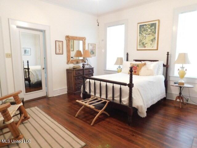 125 Riverside St, Vidalia, LA 71373 - bedroom featuring wood finished floors