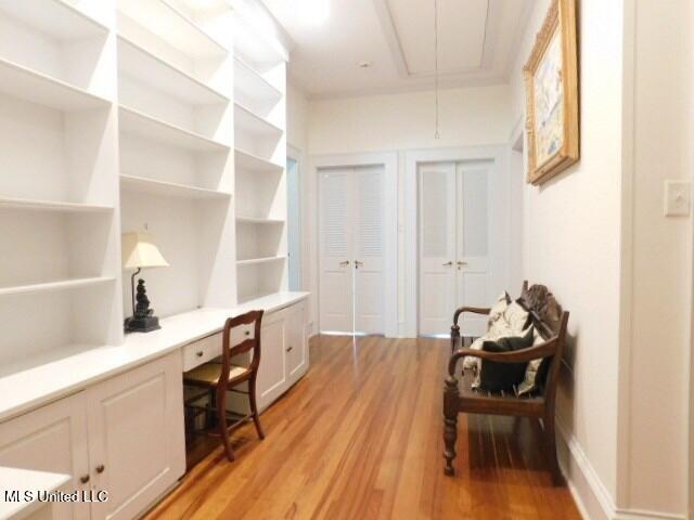 125 Riverside St, Vidalia, LA 71373 - office space with attic access, built in desk, and light wood finished floors