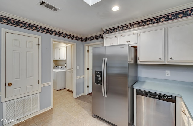 kitchen featuring visible vents, appliances with stainless steel finishes, white cabinets, and light countertops