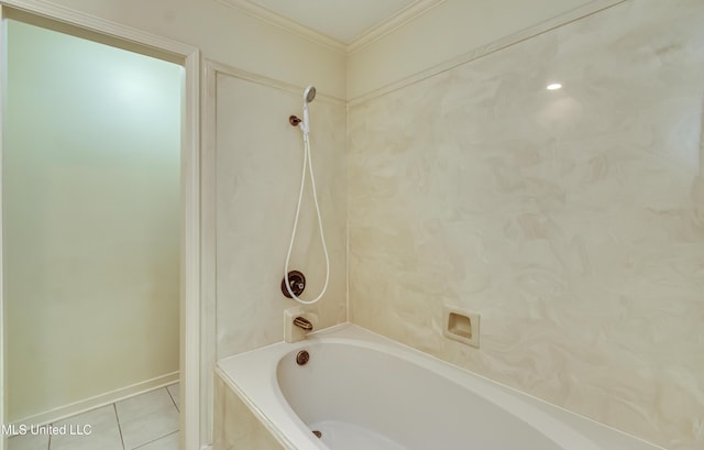 bathroom with ornamental molding, tile patterned flooring, and bathing tub / shower combination